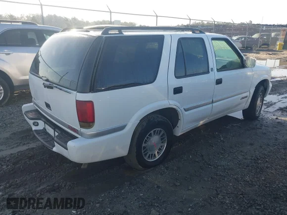 ✅ 2000 GMC Jimmy SLE Convenience • VIN: 1GKDT13W7Y2323044 • Лот: 43398834. Опубліковано раніше на IAAI з пробігом 62 561 миль. Безкоштовний доступ до архіву аукціонних продажів зі США та докладний звіт про історію автомобіля на DreamBid. Зображення 4.