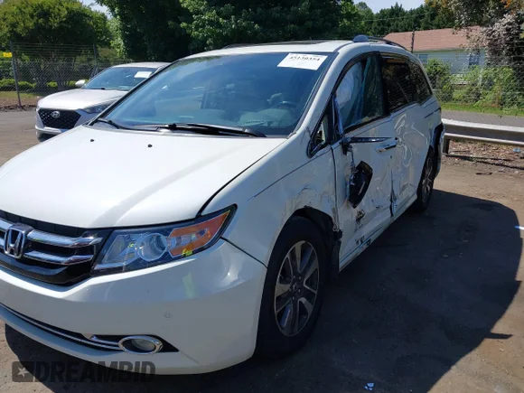 ✅ 2016 Honda Odyssey Touring Elite • VIN: 5FNRL5H90GB068289 • Lot: 45130354. Wystawiony na IAAI z przebiegiem 81 063 mil. Bezpłatny archiwum sprzedaży aukcyjnych z USA i szczegółowy raport historii pojazdu na DreamBid. Zdjęcie 2.