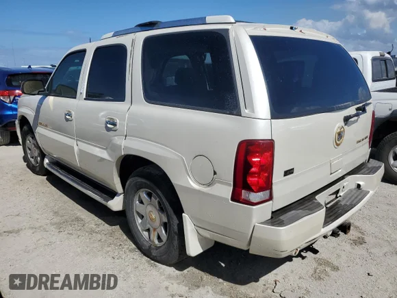 ✅ 2004 Cadillac Escalade • VIN: 1GYEC63T24R301838 • Lot: 76880584. Wystawiony na Copart z przebiegiem Nie podano. Bezpłatny archiwum sprzedaży aukcyjnych z USA i szczegółowy raport historii pojazdu na DreamBid. Zdjęcie 2.