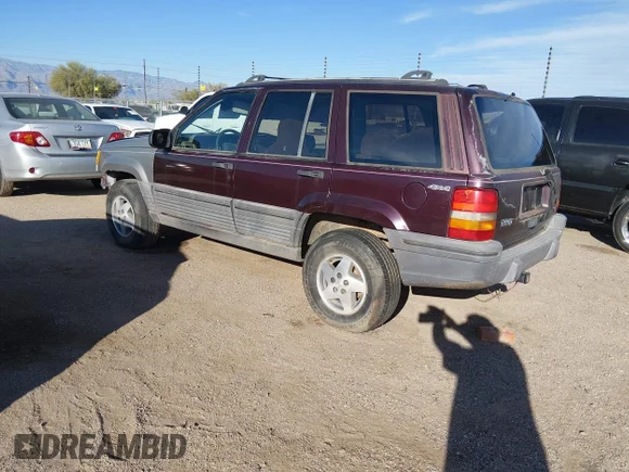 ✅ 1994 Jeep Grand Cherokee Laredo • VIN: 1J4GZ58S3RC122588 • Лот: 44485557. Опубліковано раніше на IAAI з пробігом 180 184 миль. Безкоштовний доступ до архіву аукціонних продажів зі США та докладний звіт про історію автомобіля на DreamBid. Зображення 3.