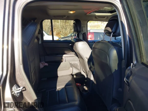 ✅ 2015 Jeep Patriot High Altitude • VIN: 1C4NJRFB5FD218016 • Lot: 43981679. Listed on IAAI with 102,076 mi. Free auction sales archive from the USA and detailed vehicle history report at DreamBid. Image 8.