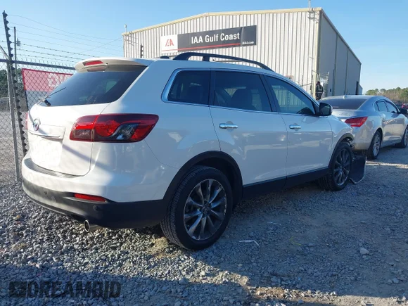 ✅ 2015 Mazda CX-9 Grand Touring • VIN: JM3TB2DA7F0448385 • Лот: 44144757. Опубліковано раніше на IAAI з пробігом 193 464 миль. Безкоштовний доступ до архіву аукціонних продажів зі США та докладний звіт про історію автомобіля на DreamBid. Зображення 4.