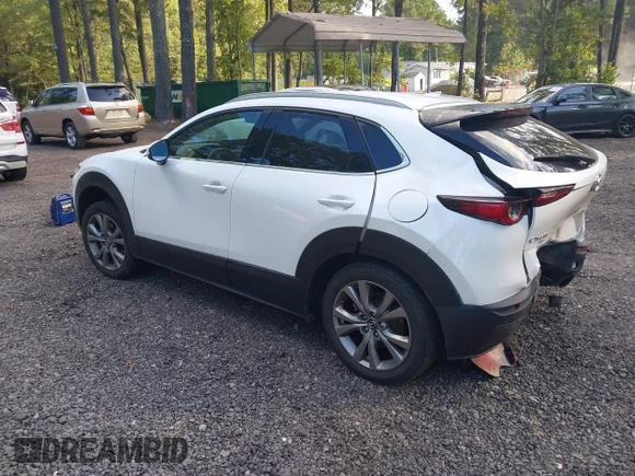 ✅ 2023 Mazda CX-30 S Premium • VIN: 3MVDMBDM6PM563039 • Лот: 43361619. Опубліковано раніше на IAAI з пробігом 59 492 миль. Безкоштовний доступ до архіву аукціонних продажів зі США та докладний звіт про історію автомобіля на DreamBid. Зображення 3.
