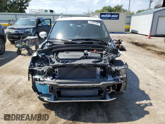 ✅ 2023 MINI Countryman Cooper S • VIN: WMZ83BR05P3P98030 • Lot: 71429184. Wystawiony na Copart z przebiegiem 23 189 mil. Bezpłatny archiwum sprzedaży aukcyjnych z USA i szczegółowy raport historii pojazdu na DreamBid. Zdjęcie 5.