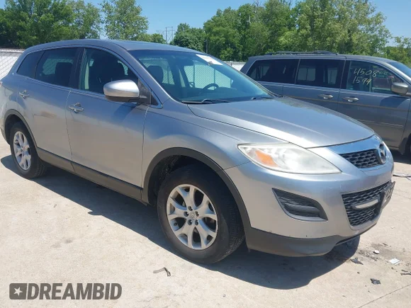 ✅ 2012 Mazda CX-9 Touring • VIN: JM3TB2CA9C0353310 • Lot: 45097593. Listed on IAAI with 151,891 mi. Free auction sales archive from the USA and detailed vehicle history report at DreamBid. Image 1.