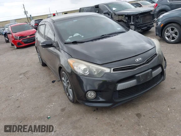 ✅ 2015 Kia Forte SX • VIN: KNAFZ5A34F5397243 • Lot: 44114087. Listed on IAAI with 133,581 mi. Free auction sales archive from the USA and detailed vehicle history report at DreamBid. Image 1.