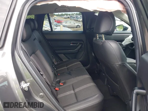 ✅ 2024 Mazda CX-50 S Preferred • VIN: 7MMVABBMXRN225783 • Lot: 42993884. Wystawiony na IAAI z przebiegiem 5 976 mil. Bezpłatny archiwum sprzedaży aukcyjnych z USA i szczegółowy raport historii pojazdu na DreamBid. Zdjęcie 8.