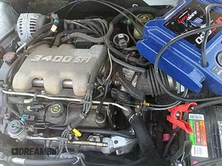 ✅ 2000 Oldsmobile Alero GL3 • VIN: 1G3NL52E4YC403539 • Lot: 42313033. Listed on IAAI with Not provided. Free auction sales archive from the USA and detailed vehicle history report at DreamBid. Image 12.