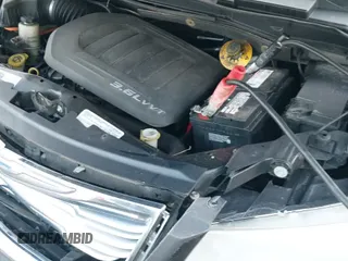 ✅ 2015 Chrysler Town & Country Touring • VIN: 2C4RC1BG8FR587724 • Lot: 43727524. Listed on IAAI with 142,148 mi. Free auction sales archive from the USA and detailed vehicle history report at DreamBid. Image 20.