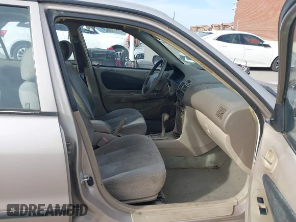 ✅ 2000 Toyota Corolla VE • VIN: 1NXBR12EXYZ337319 • Лот: 43990215. Опубликован ранее на IAAI с пробегом 202 748 миль. Бесплатный доступ к архиву аукционных продаж из США и подробный отчёт об истории автомобиля на DreamBid. Изображение 5.