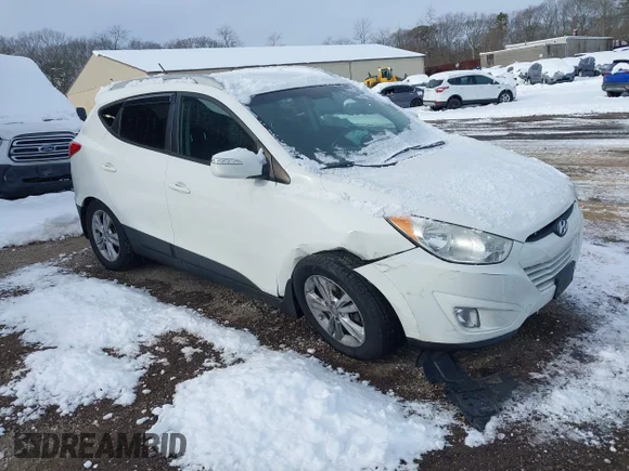 ✅ 2013 Hyundai Tucson Limited • VIN: KM8JUCAC7DU573300 • Lot: 43924638. Listed on IAAI with 125,237 mi. Free auction sales archive from the USA and detailed vehicle history report at DreamBid. Image 1.