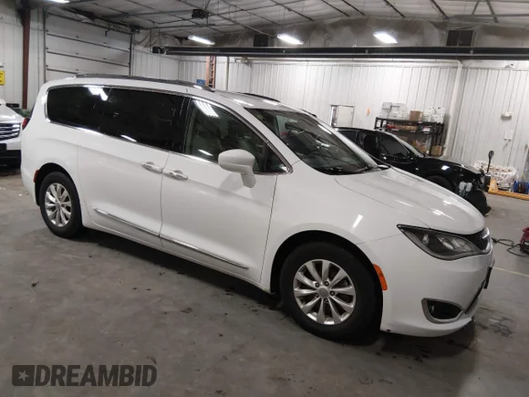 ✅ 2018 Chrysler Pacifica Touring L Plus • VIN: 2C4RC1EG0JR154774 • Lot: 45264323. Listed on IAAI with 103,987 mi. Free auction sales archive from the USA and detailed vehicle history report at DreamBid. Image 1.