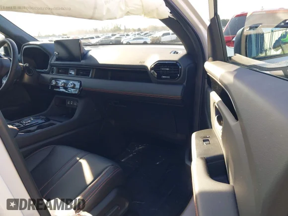 ✅ 2025 Honda Pilot TrailSport • VIN: 5FNYG1H63SB051817 • Лот: 41434021. Опубликован ранее на IAAI с пробегом 895 миль. Бесплатный доступ к архиву аукционных продаж из США и подробный отчёт об истории автомобиля на DreamBid. Изображение 5.