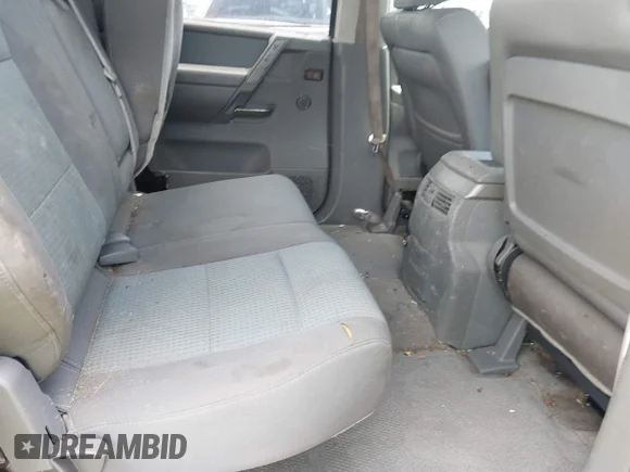 ✅ 2005 Nissan Titan XE • VIN: 1N6BA07A85N575751 • Lot: 42674936. Wystawiony na IAAI z przebiegiem 314 029 mil. Bezpłatny archiwum sprzedaży aukcyjnych z USA i szczegółowy raport historii pojazdu na DreamBid. Zdjęcie 8.