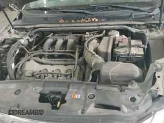 ✅ 2012 Ford Taurus SEL • VIN: 1FAHP2EW0CG114749 • Lot: 43311085. Listed on IAAI with 180,749 mi. Free auction sales archive from the USA and detailed vehicle history report at DreamBid. Image 13.