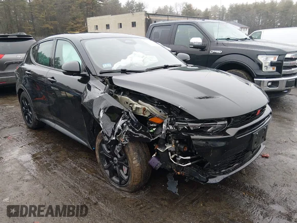 ✅ 2024 Dodge Hornet R/T • VIN: ZACPDFCW0R3A12122 • Lot: 44582320. Listed on IAAI with 23,745 mi. Free auction sales archive from the USA and detailed vehicle history report at DreamBid. Image 1.