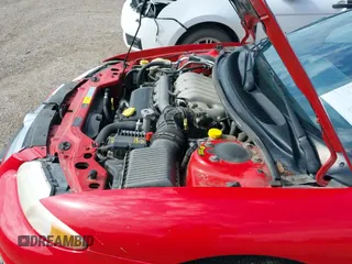 ✅ 1997 Chrysler Sebring JX • VIN: 3C3EL45HXVT591469 • Lot: 42592319. Listed on IAAI with 89,637 mi. Free auction sales archive from the USA and detailed vehicle history report at DreamBid. Image 13.