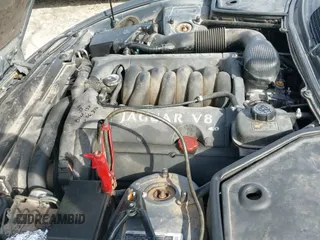 ✅ 2001 Jaguar XK • VIN: SAJDA42CX1NA13828 • Лот: 41600573. Опубликован ранее на IAAI с пробегом 142 303 миль. Бесплатный доступ к архиву аукционных продаж из США и подробный отчёт об истории автомобиля на DreamBid. Изображение 13.