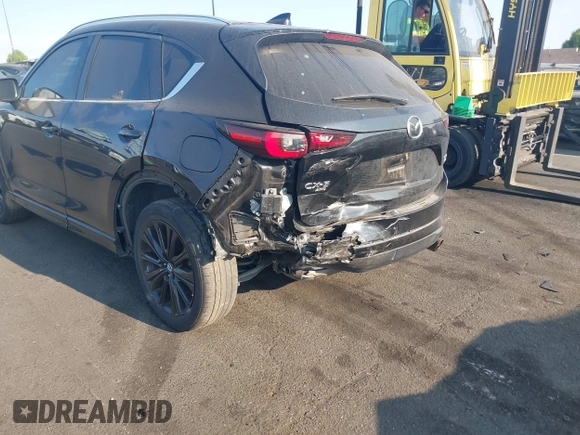 ✅ 2022 Mazda CX-5 2.5 Turbo • VIN: JM3KFBAY2N0570393 • Lot: 42747148. Wystawiony na IAAI z przebiegiem 55 762 mil. Bezpłatny archiwum sprzedaży aukcyjnych z USA i szczegółowy raport historii pojazdu na DreamBid. Zdjęcie 6.