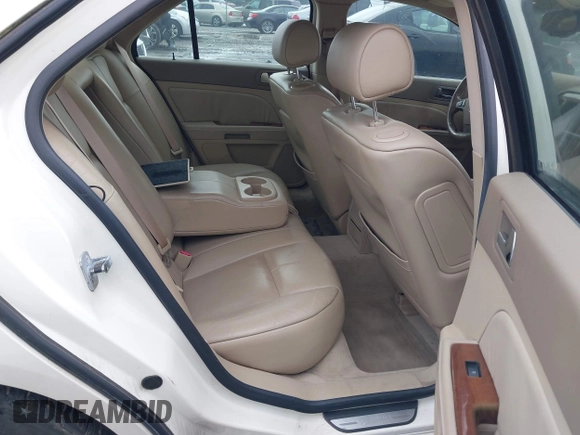 ✅ 2006 Cadillac STS • VIN: 1G6DC67A960130364 • Lot: 42415734. Wystawiony na IAAI z przebiegiem 128 015 mil. Bezpłatny archiwum sprzedaży aukcyjnych z USA i szczegółowy raport historii pojazdu na DreamBid. Zdjęcie 8.