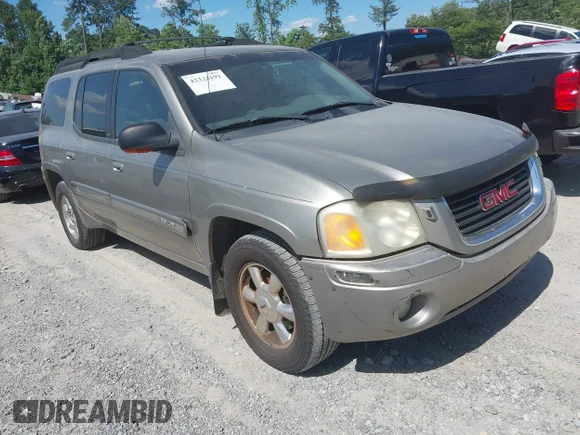 ✅ 2003 GMC Envoy SLT • VIN: 1GKET16S336103463 • Lot: 42324192. Wystawiony na IAAI z przebiegiem 238 395 mil. Bezpłatny archiwum sprzedaży aukcyjnych z USA i szczegółowy raport historii pojazdu na DreamBid. Zdjęcie 1.