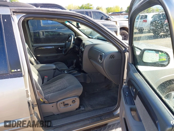 ✅ 2002 GMC Envoy SLE • VIN: 1GKDT13S122105704 • Lot: 44924721. Wystawiony na IAAI z przebiegiem 128 113 mil. Bezpłatny archiwum sprzedaży aukcyjnych z USA i szczegółowy raport historii pojazdu na DreamBid. Zdjęcie 5.