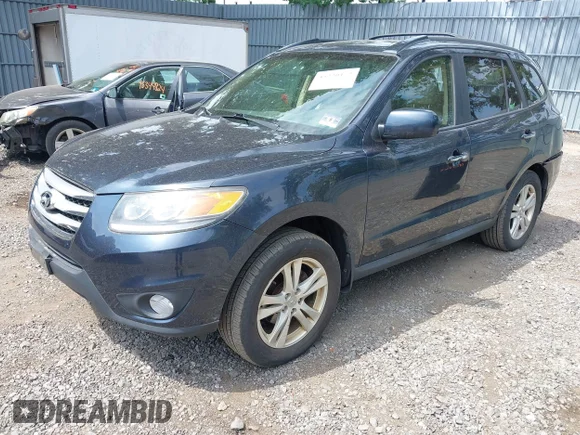 ✅ 2012 Hyundai Santa Fe Limited • VIN: 5XYZKDAG1CG098944 • Лот: 45330172. Опубліковано раніше на IAAI з пробігом 145 180 миль. Безкоштовний доступ до архіву аукціонних продажів зі США та докладний звіт про історію автомобіля на DreamBid. Зображення 2.