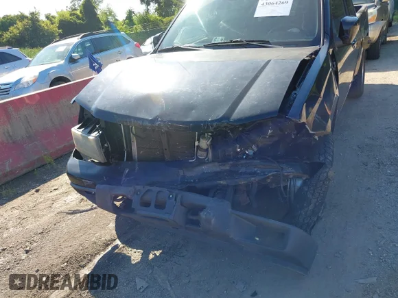 ✅ 2009 Chevrolet Colorado Work Truck • VIN: 1GCDT19E798135391 • Lot: 43064269. Wystawiony na IAAI z przebiegiem 205 139 mil. Bezpłatny archiwum sprzedaży aukcyjnych z USA i szczegółowy raport historii pojazdu na DreamBid. Zdjęcie 6.