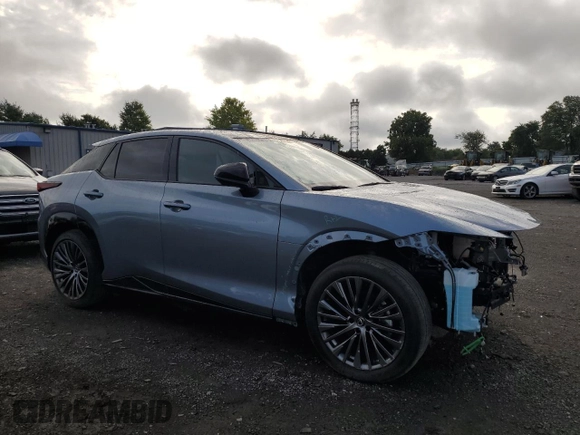 ✅ 2023 Lexus RZ 450e Premium • VIN: JTJAAAAB0PA011699 • Lot: 65108714. Listed on Copart with 12,365 mi. Free auction sales archive from the USA and detailed vehicle history report at DreamBid. Image 4.