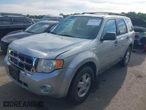 ✅ 2009 Ford Escape XLT • VIN: 1FMCU03G19KA65849 • Lot: 45392153. Listed on IAAI with 246,684 mi. Free auction sales archive from the USA and detailed vehicle history report at DreamBid. Image 2.