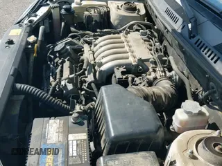 2005 Hyundai Santa Fe GLS z VIN KM8SC73E75U968818, wystawiony jako IAAI lot #43040301 z przebiegiem 200 279 mil mil oraz . Historia ofert i sprzedaży dostępna na DreamBid. Obrazek 13.