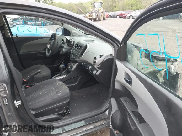 ✅ 2014 Chevrolet Sonic LT • VIN: 1G1JC5SH1E4217657 • Lot: 45112455. Listed on IAAI with 131,338 mi. Free auction sales archive from the USA and detailed vehicle history report at DreamBid. Image 5.