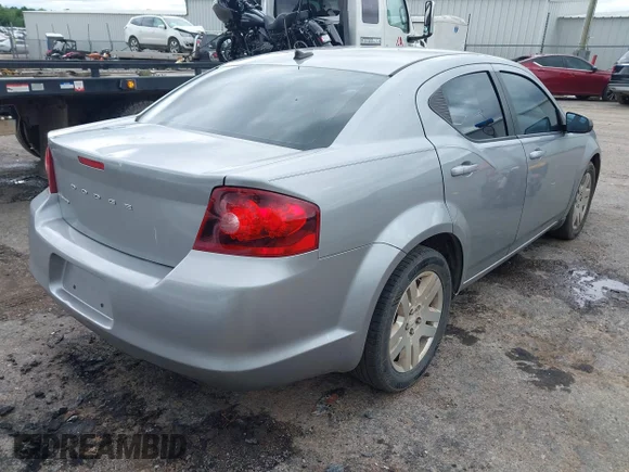 ✅ 2013 Dodge Avenger SE • VIN: 1C3CDZAB4DN729993 • Lot: 42348647. Listed on IAAI with 146,837 mi. Free auction sales archive from the USA and detailed vehicle history report at DreamBid. Image 4.