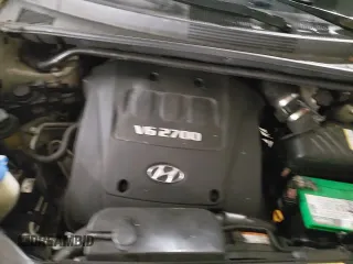 2007 Hyundai Tucson SE z VIN KM8JN72D07U592187, wystawiony jako Copart lot #85103324 z przebiegiem 153 892 mil mil oraz Szkoda całkowita • Salvage title. Historia ofert i sprzedaży dostępna na DreamBid. Obrazek 14.