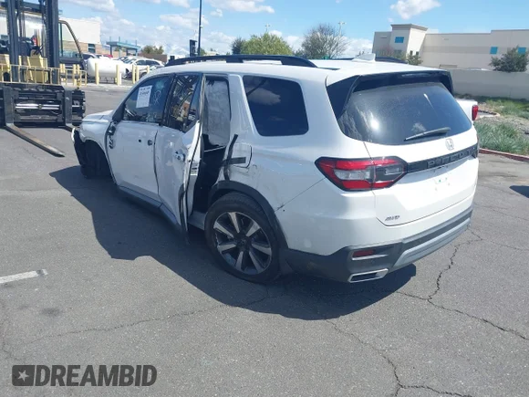 ✅ 2023 Honda Pilot Elite • VIN: 5FNYG1H8XPB016782 • Лот: 41566649. Опубликован ранее на IAAI с пробегом Не указан. Бесплатный доступ к архиву аукционных продаж из США и подробный отчёт об истории автомобиля на DreamBid. Изображение 3.