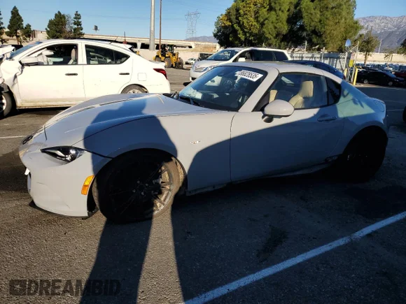 ✅ 2024 Mazda MX-5 Miata Grand Touring • VIN: JM1NDAM71R0610039 • Лот: 86828535. Опубліковано раніше на Copart з пробігом 11 246 миль. Безкоштовний доступ до архіву аукціонних продажів зі США та докладний звіт про історію автомобіля на DreamBid. Зображення 1.