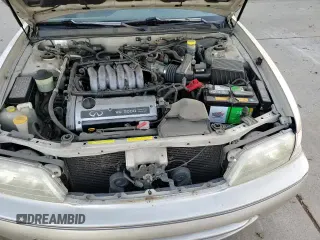 ✅ 1999 Infiniti I30 • VIN: JNKCA21A9XT773537 • Lot: 87487914. Listed on Copart with 144,583 mi. Free auction sales archive from the USA and detailed vehicle history report at DreamBid. Image 13.