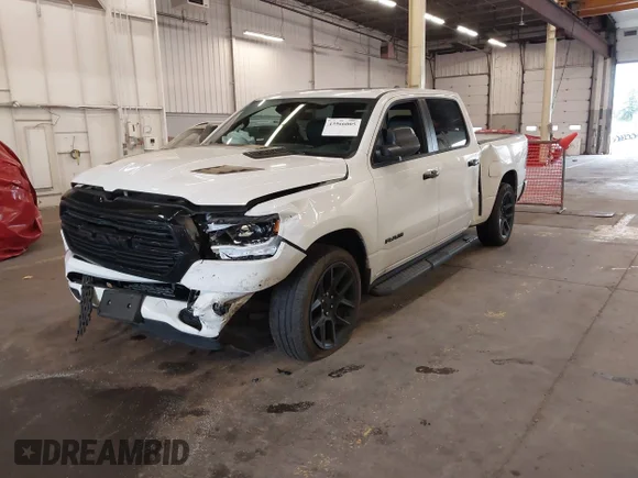 ✅ 2023 Ram 1500 Laramie • VIN: 1C6SRFRTXPN525876 • Lot: 43966005. Listed on IAAI with 30,408 mi. Free auction sales archive from the USA and detailed vehicle history report at DreamBid. Image 2.