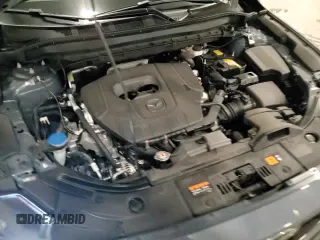 ✅ 2025 Mazda CX-5 S Carbon Edition • VIN: JM3KFBCM5S0700253 • Лот: 93695225. Опубликован ранее на Copart с пробегом 15 111 миль. Бесплатный доступ к архиву аукционных продаж из США и подробный отчёт об истории автомобиля на DreamBid. Изображение 14.