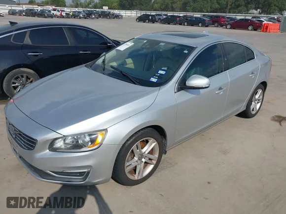 ✅ 2014 Volvo S60 T5 • VIN: YV1612FS1E1291373 • Лот: 42750343. Опубліковано раніше на IAAI з пробігом 117 042 миль. Безкоштовний доступ до архіву аукціонних продажів зі США та докладний звіт про історію автомобіля на DreamBid. Зображення 2.