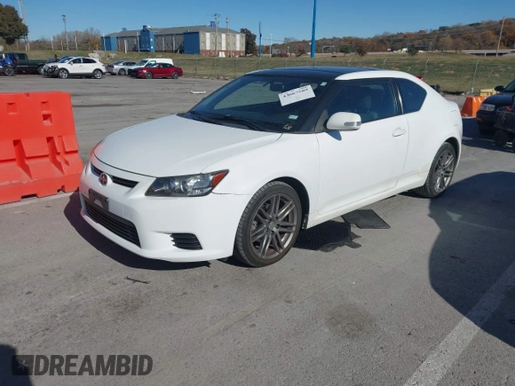 ✅ 2012 Scion tC • VIN: JTKJF5C70C3042575 • Lot: 43667589. Wystawiony na IAAI z przebiegiem 109 616 mil. Bezpłatny archiwum sprzedaży aukcyjnych z USA i szczegółowy raport historii pojazdu na DreamBid. Zdjęcie 2.
