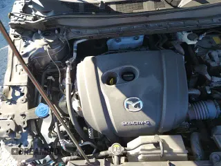 ✅ 2022 Mazda CX-5 S Premium Plus • VIN: JM3KFBEM1N1595691 • Лот: 91881445. Опубликован ранее на Copart с пробегом 63 692 миль. Бесплатный доступ к архиву аукционных продаж из США и подробный отчёт об истории автомобиля на DreamBid. Изображение 15.