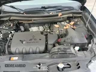 ✅ 2017 Mitsubishi Outlander ES • VIN: JA4AZ2A36HZ062695 • Lot: 69002015. Wystawiony na Copart z przebiegiem 68 703 mil. Bezpłatny archiwum sprzedaży aukcyjnych z USA i szczegółowy raport historii pojazdu na DreamBid. Zdjęcie 13.