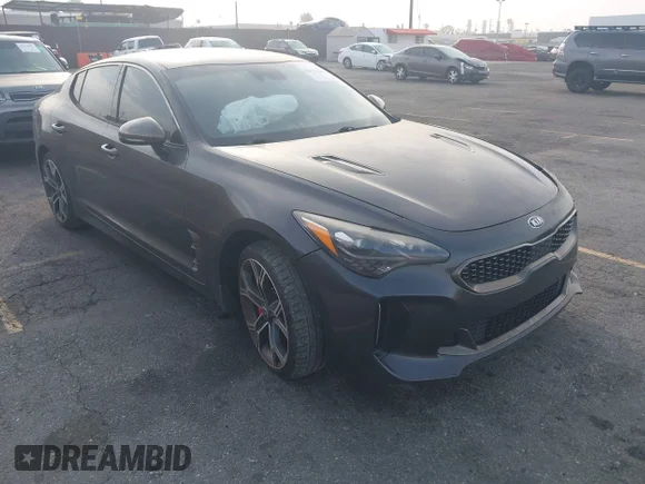 ✅ 2018 Kia Stinger GT • VIN: KNAE35LCXJ6027220 • Lot: 44732299. Listed on IAAI with 74,596 mi. Free auction sales archive from the USA and detailed vehicle history report at DreamBid. Image 1.