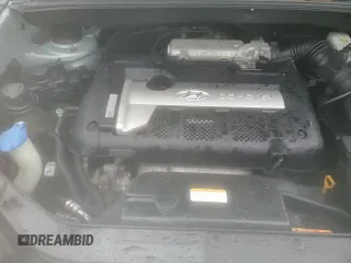 2006 Hyundai Tucson GL z VIN KM8JM12BX6U432539, wystawiony jako Copart lot #84570944 z przebiegiem 93 077 mil mil oraz Czysty tytuł • Clean title. Historia ofert i sprzedaży dostępna na DreamBid. Obrazek 14.