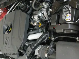 ✅ 2025 Mazda CX-50 S Preferred • VIN: 7MMVABBMXSN373213 • Lot: 43303287. Listed on IAAI with 3,563 mi. Free auction sales archive from the USA and detailed vehicle history report at DreamBid. Image 19.