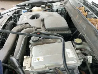 ✅ 2013 Ford Fusion Titanium Hybrid • VIN: 3FA6P0RU5DR286001 • Лот: 42097758. Опубликован ранее на IAAI с пробегом 150 069 миль. Бесплатный доступ к архиву аукционных продаж из США и подробный отчёт об истории автомобиля на DreamBid. Изображение 12.