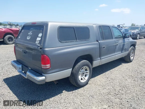 ✅ 2001 Dodge Dakota Sport • VIN: 1B7HL2AN61S311227 • Лот: 42366024. Опубліковано раніше на IAAI з пробігом 222 153 миль. Безкоштовний доступ до архіву аукціонних продажів зі США та докладний звіт про історію автомобіля на DreamBid. Зображення 4.