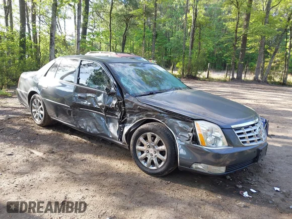 ✅ 2009 Cadillac DTS 1SA • VIN: 1G6KD57Y79U142537 • Лот: 42119235. Опубликован ранее на IAAI с пробегом 107 289 миль. Бесплатный доступ к архиву аукционных продаж из США и подробный отчёт об истории автомобиля на DreamBid. Изображение 1.