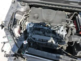 2019 Toyota Camry LE z VIN 4T1B11HK7KU815143, wystawiony jako Copart lot #69475835 z przebiegiem 122 992 mil mil oraz Szkoda całkowita • Salvage title. Historia ofert i sprzedaży dostępna na DreamBid. Obrazek 13.